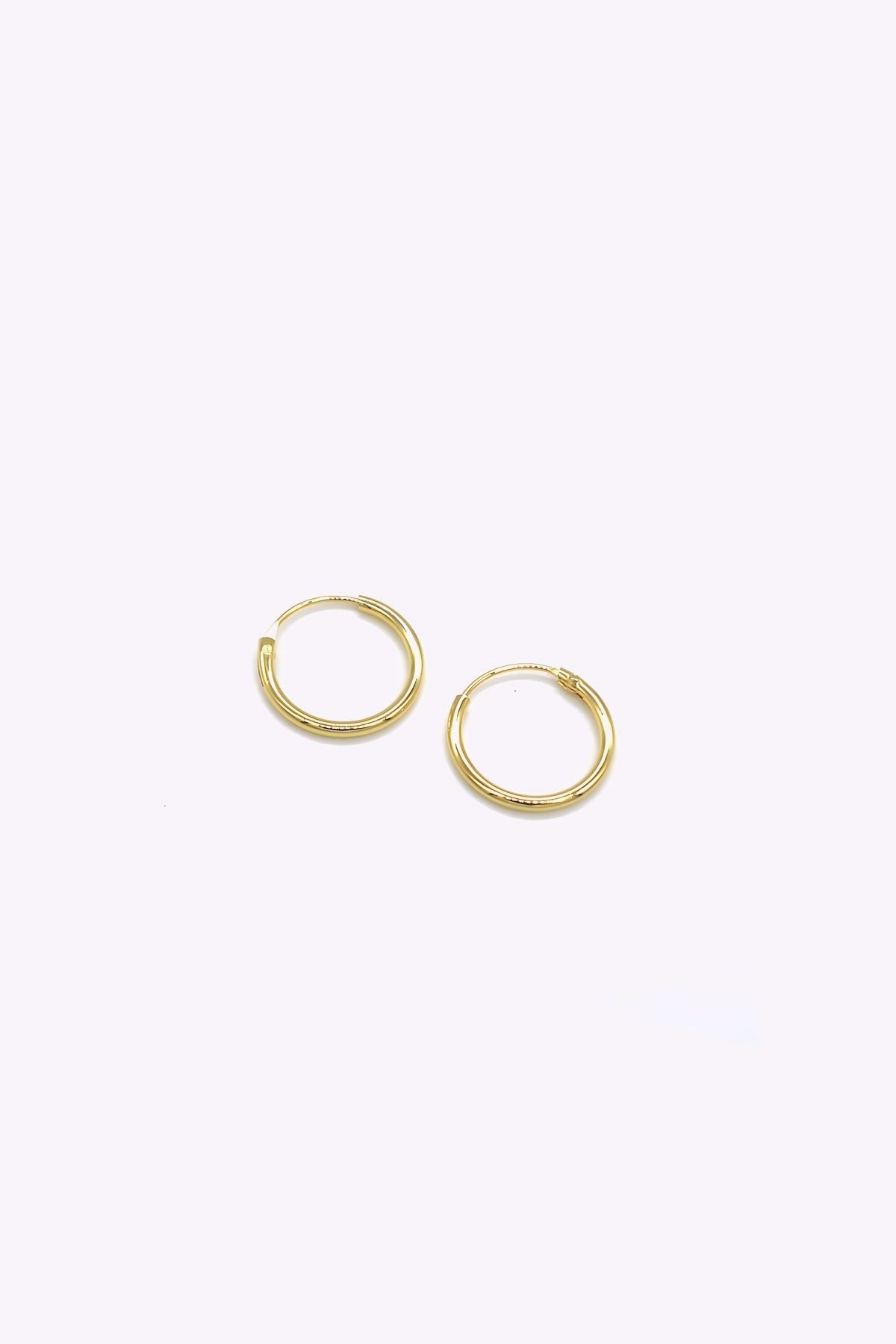 Guldpläterade silver hoops | BADIA